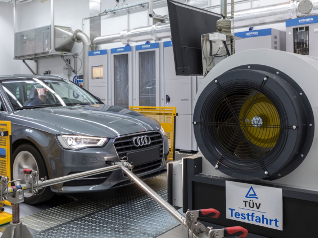 Vehicle undergoing exhaust and fuel consumption testing