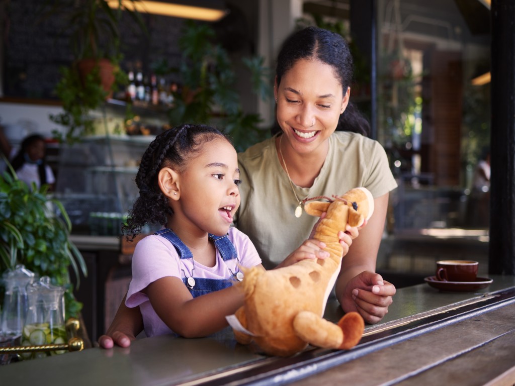 Mother and child with toy